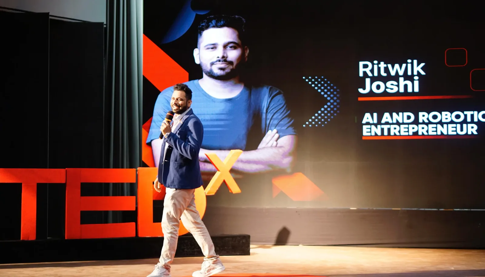Ritwik Joshi delivering TEDx talk at TEDxOIST Bhopal