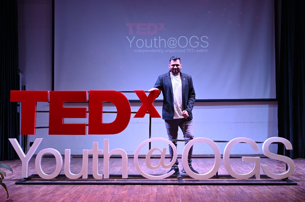 Ritwik Joshi commanding the stage at TEDxYouth discussing the emergence of Agentic AI.